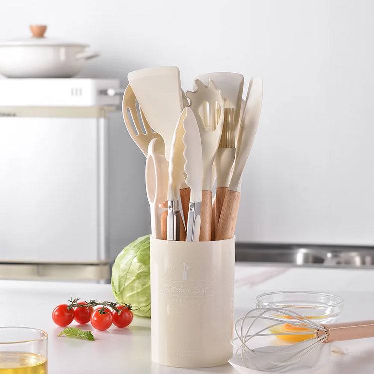 Magnifique ensemble d'ustensiles de cuisine en silicone sans BPA, résistants à la chaleur, anti-rayures avec manche en bois et bac de rangement, idéal pour cuisiner en toute sérénité. 12 pièces, produit Premium. La livraison est offerte !
