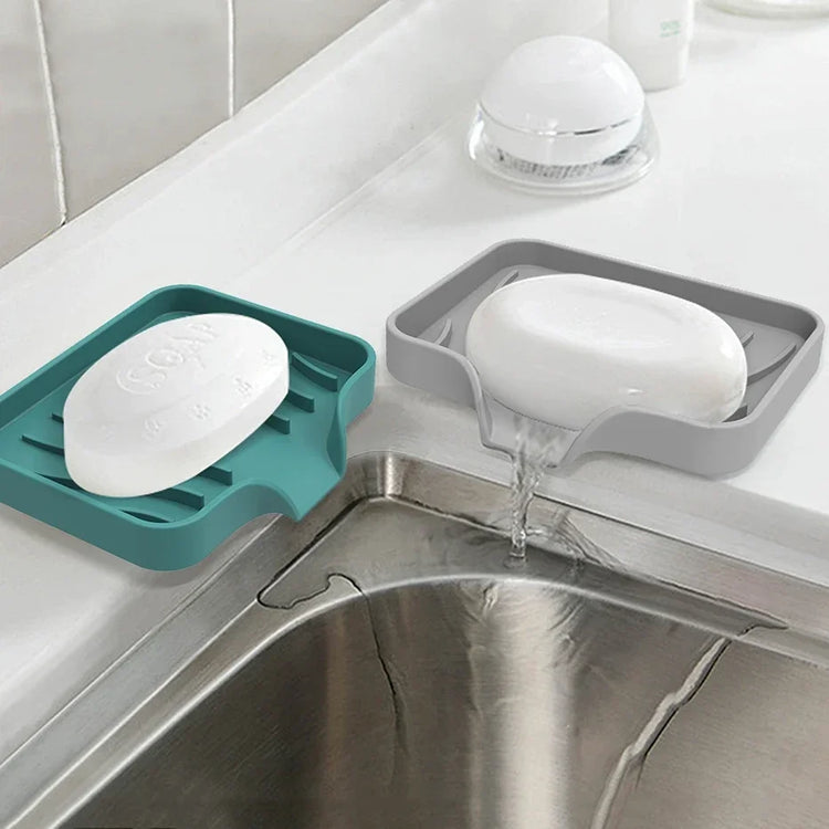 Porte-savon et porte-éponges en silicone avec système auto-drainant, anti-fondant et antidérapant, idéal pour salle de bain, baignoire et cuisine, matériaux durables et polyvalence accrue. La livraison est offerte !