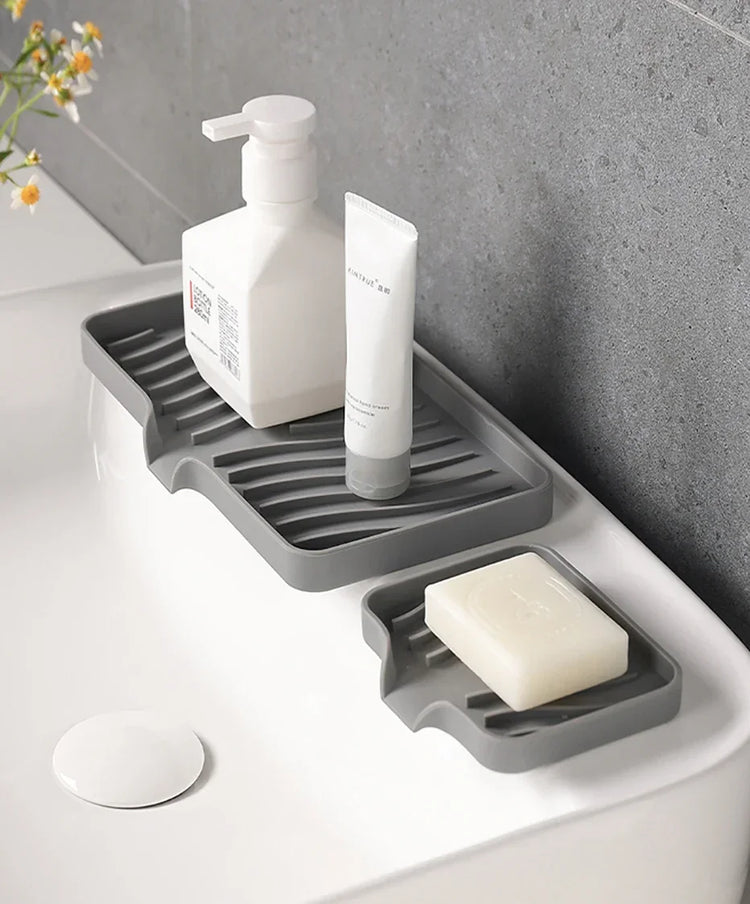 Porte-savon et porte-éponges en silicone avec système auto-drainant, anti-fondant et antidérapant, idéal pour salle de bain, baignoire et cuisine, matériaux durables et polyvalence accrue. La livraison est offerte !