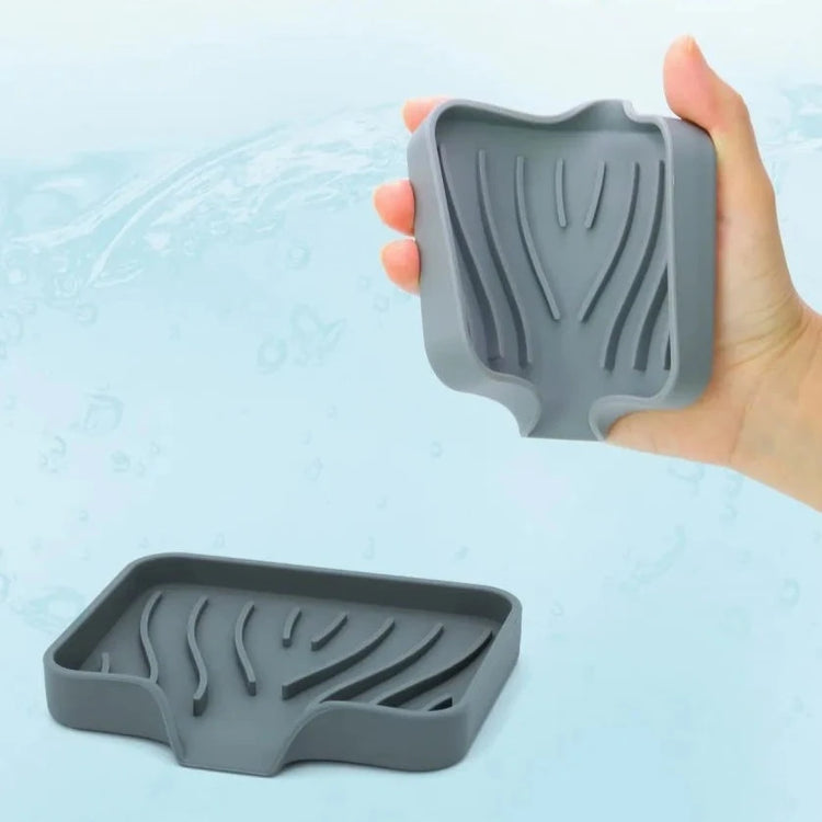 Porte-savon et porte-éponges en silicone avec système auto-drainant, anti-fondant et antidérapant, idéal pour salle de bain, baignoire et cuisine, matériaux durables et polyvalence accrue. La livraison est offerte !