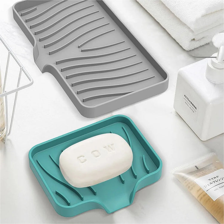 Porte-savon et porte-éponges en silicone avec système auto-drainant, anti-fondant et antidérapant, idéal pour salle de bain, baignoire et cuisine, matériaux durables et polyvalence accrue. La livraison est offerte !
