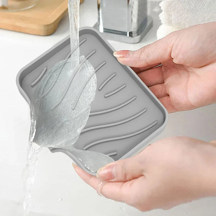 Porte-savon et porte-éponges en silicone avec système auto-drainant, anti-fondant et antidérapant, idéal pour salle de bain, baignoire et cuisine, matériaux durables et polyvalence accrue. La livraison est offerte !