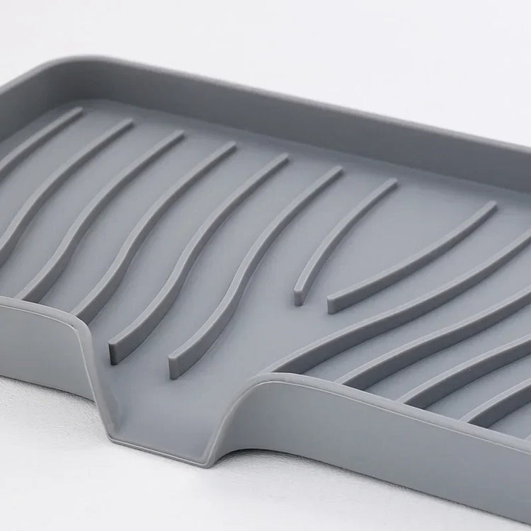 Porte-savon et porte-éponges en silicone avec système auto-drainant, anti-fondant et antidérapant, idéal pour salle de bain, baignoire et cuisine, matériaux durables et polyvalence accrue. La livraison est offerte !