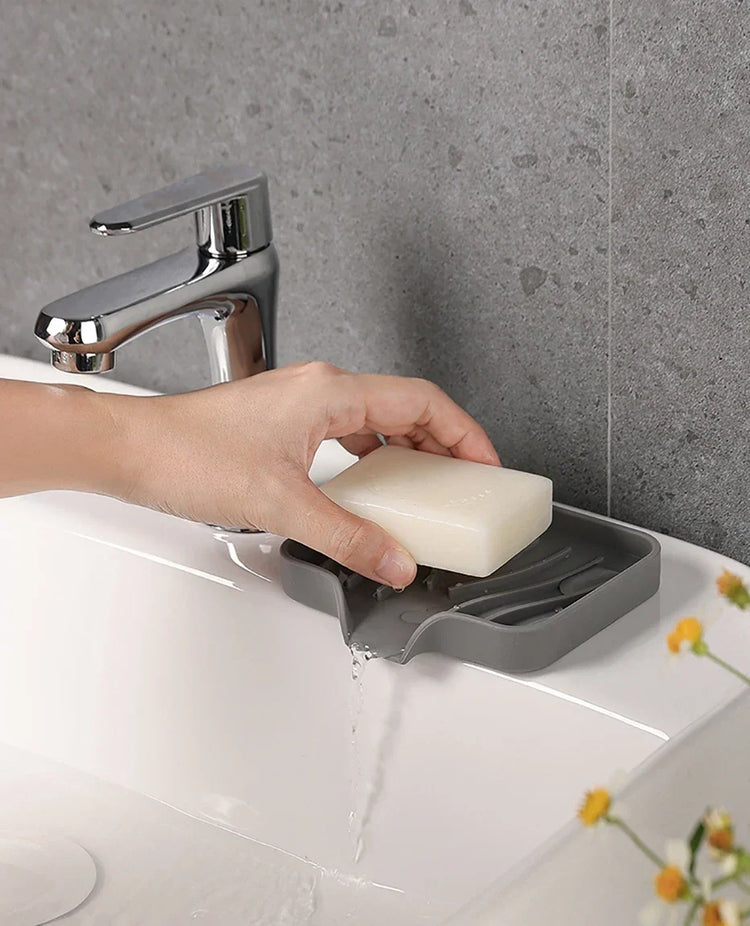 Porte-savon et porte-éponges en silicone avec système auto-drainant, anti-fondant et antidérapant, idéal pour salle de bain, baignoire et cuisine, matériaux durables et polyvalence accrue. La livraison est offerte !