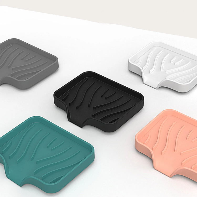 Porte-savon et porte-éponges en silicone avec système auto-drainant, anti-fondant et antidérapant, idéal pour salle de bain, baignoire et cuisine, matériaux durables et polyvalence accrue. La livraison est offerte !