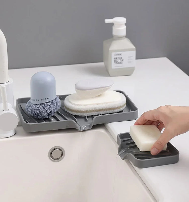 Porte-savon et porte-éponges en silicone avec système auto-drainant, anti-fondant et antidérapant, idéal pour salle de bain, baignoire et cuisine, matériaux durables et polyvalence accrue. La livraison est offerte !
