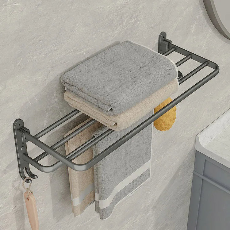 Porte-serviettes mural pliable en acier inoxydable avec barres et crochets, installation adhésive ou par perçage, idéal pour salles de bain et cuisines. La livraison prioritaire est offerte !