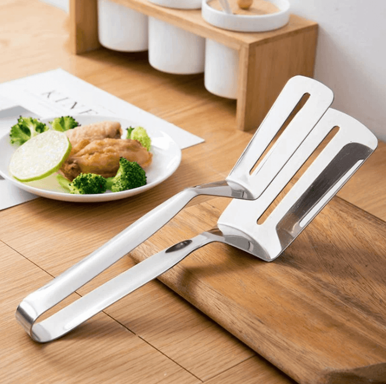 Double pince-spatule multifonction en acier inoxydable. La livraison est offerte !
